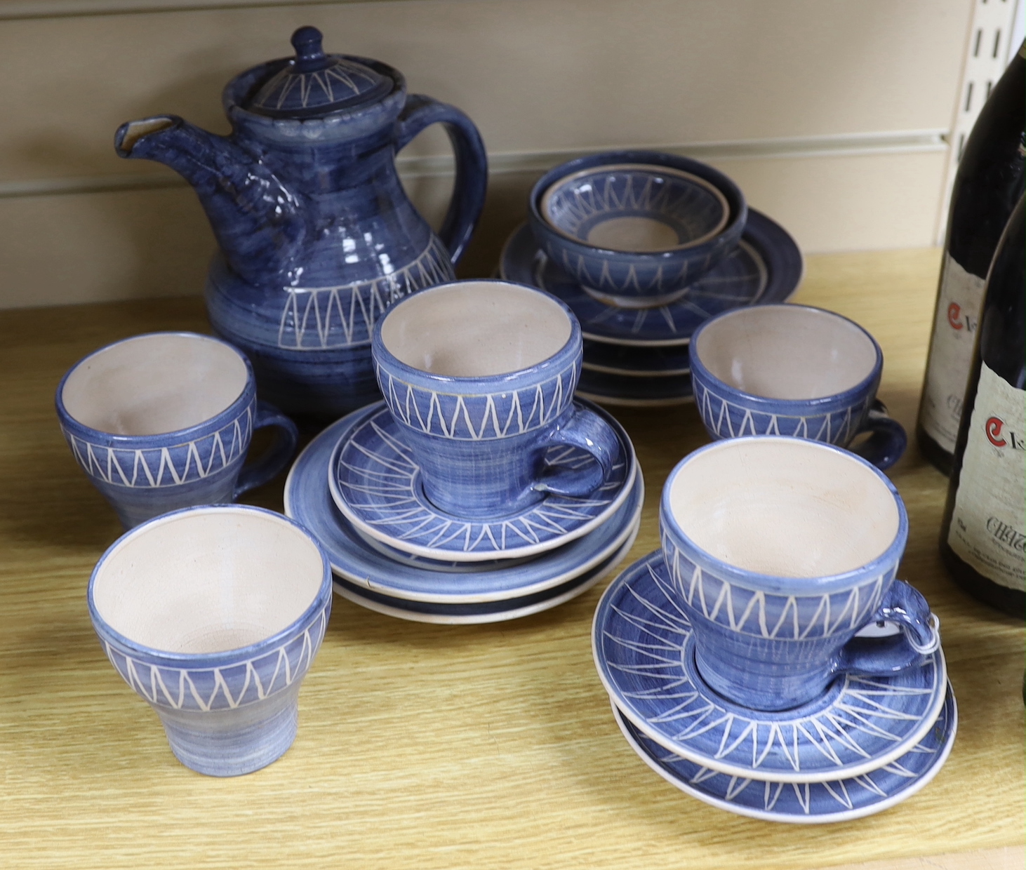 A tin glazed pottery coffee set, base signed W.